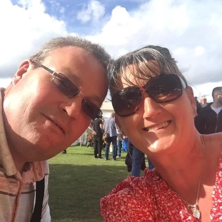Lisa and Mike, foster carers from Merthyr on a summers day in the park at an event